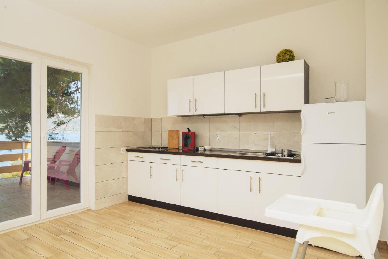 Villa Bua - Beautiful Seafront Apartments Trogir Bagian luar foto